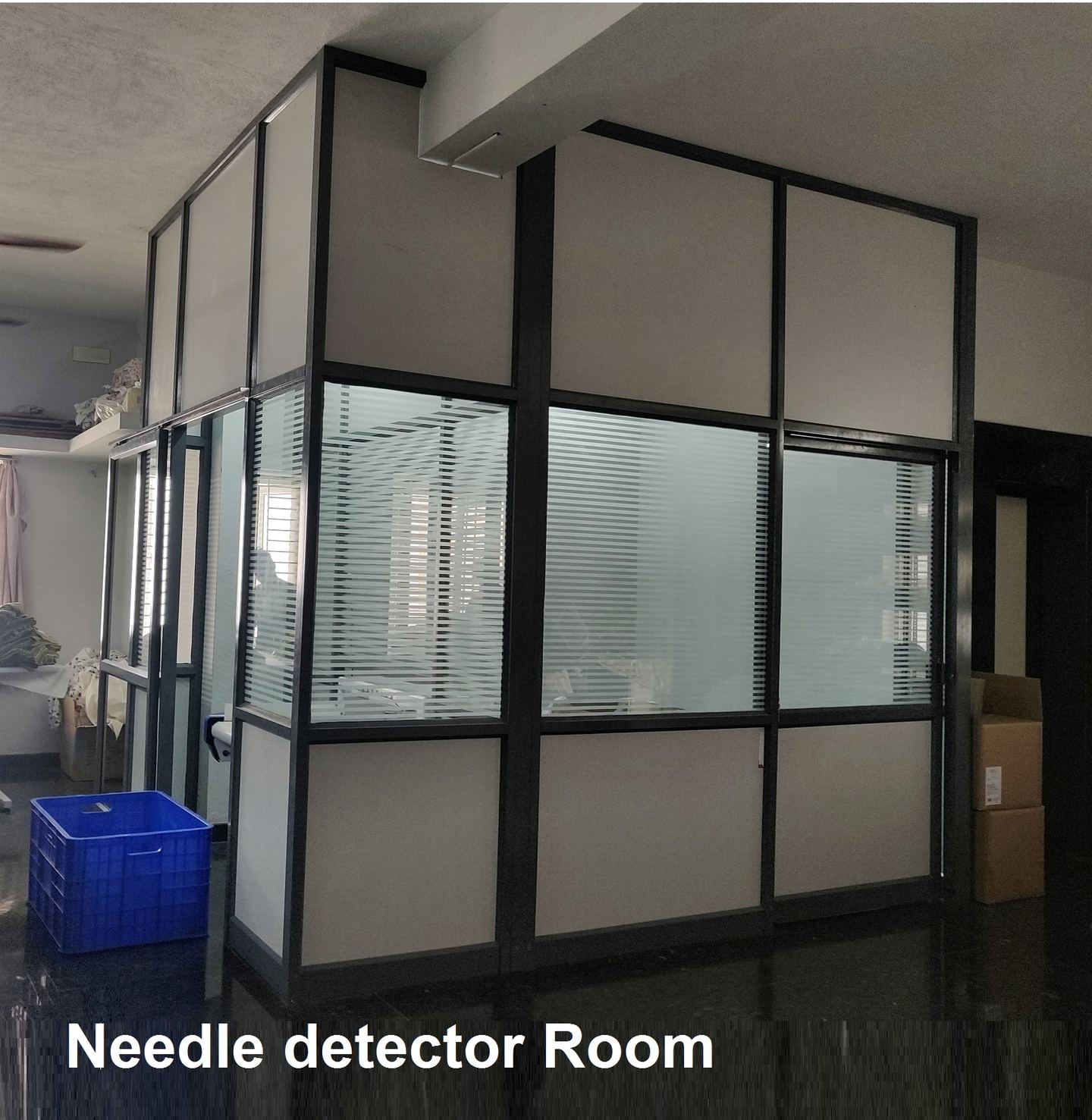 Dedicated needle detection room with glass partitions